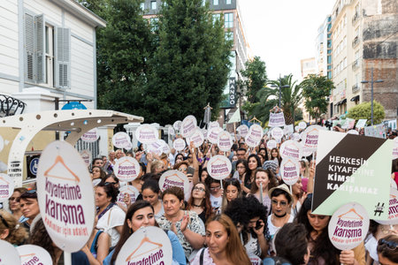Women Protesters rally in kadikoy against interfering women clothes. Women carry"Do not touch my clothes" banners: TURKEY, ISTANBUL,29 JULY 2017のeditorial素材