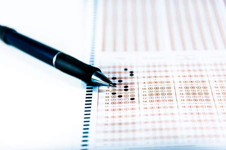 Pencil over filled typical multiple choice answer sheet.copy space for text.の写真素材