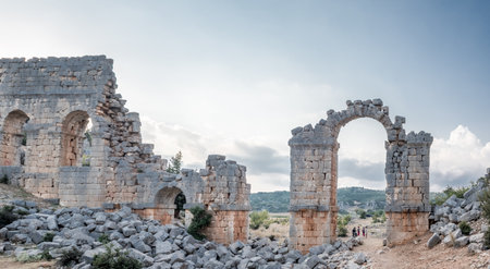 With blue sky,view of aqueducts or water bridges at  Olba Ancient city located in Uzuncaburc,Silifke,Mersin,Turkey.のeditorial素材