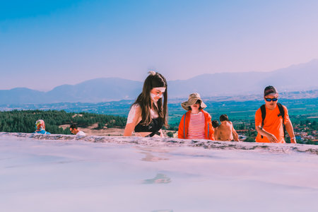 Unidentified people visit Pamukkale (Cotton Castle) that is popular with Travertine pools and terraces  where people love to visit in Pamukkale, Turkey.25 August,2017のeditorial素材