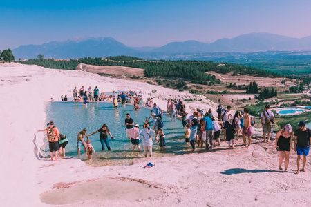 Unidentified people visit Pamukkale (Cotton Castle) that is popular with Travertine pools and terraces  where people love to visit in Pamukkale, Turkey.25 August,2017のeditorial素材