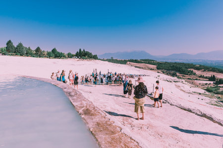 Unidentified people visit Pamukkale (Cotton Castle) that is popular with Travertine pools and terraces  where people love to visit in Pamukkale, Turkey.25 August,2017のeditorial素材