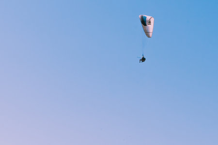 Paragliding over Pamukkale (Cotton Castle)that is popular with Travertine pools and terraces  and a paraglide on the air.のeditorial素材