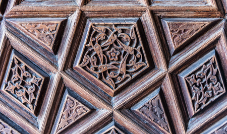Details of a fine wood carving art on the door. An Islamic art and craft.の写真素材