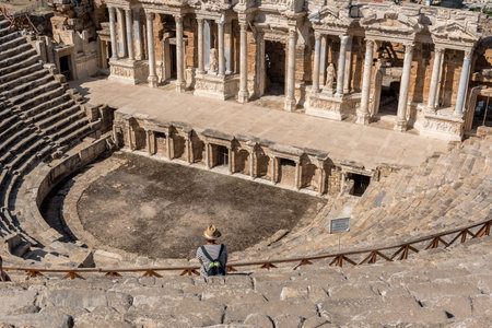 People visit The ruins of Antique Theater in ancient Greek city Hierapolis, Pamukkale, Turkey.25 August 2017のeditorial素材