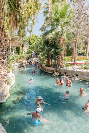 Unidentified people swim in Antique Pool of Hierapolis Ancient City in Pamukkale,Turkey.25 August,2017のeditorial素材