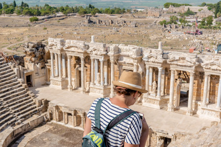People visit The ruins of Antique Theater in ancient Greek city Hierapolis, Pamukkale, Turkey.25 August 2017のeditorial素材