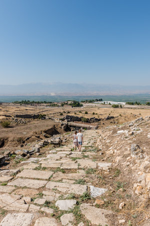 People visit the ruins of the ancient city of Hierapolis of the Roman and pre-Roman era in Pamukkale, Turkey.のeditorial素材