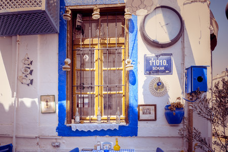 Street view of Alacati district of Cesme.Alacati  is a popular destination for traveling and vacation.Colorful Decorations hanging with different kind of ornaments in Alacati,Turkey.のeditorial素材