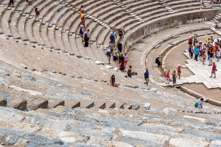People visit Amphitheatre (Coliseum) at Ephesus historical ancient city, in Selcuk,Izmir,Turkey:20 August 2017のeditorial素材