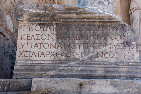 Ancient scripture on marble Ruins in Ephesus historical ancient city, in Selcuk,Izmir,Turkey.の写真素材