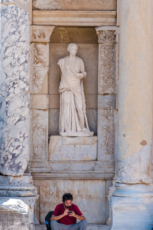 People visit Ancient Celsus Library at Ephesus historical ancient city, in Selcuk,Izmir,Turkey:20 August 2017のeditorial素材