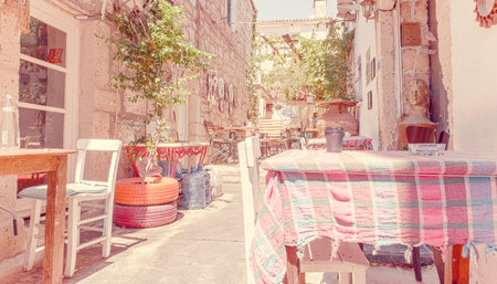 Retro Photo Filter Effect-Street view of  Alacati district of Cesme. Alacati  is a popular destination for traveling and vacation in Izmir,Turkey.26 August 2017.のeditorial素材