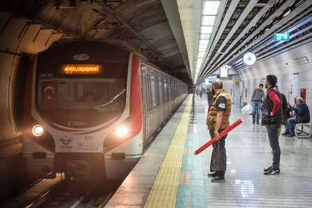 Unidentified wait for Marmaray train in Subway metro.Istanbul,Turkey,28 October 2017のeditorial素材
