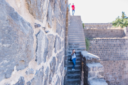 Ancient walls of Historical gate named as Mardin gate in sur region in central of Diyarbakir,Turkey.のeditorial素材