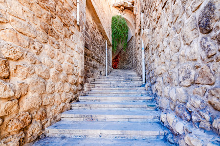 View of Old Mardin's ancient narrow street stairs in Mardin,Turkeyのeditorial素材