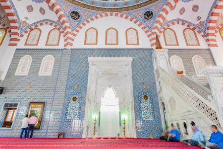 Unidentified Muslim people pray in Mevlidi Halil Mosque,one of landmarks in Sanliurfa,Turkey.19 July 2018のeditorial素材