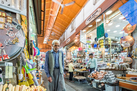 Unidentified man in local clothes walks at a bazaar Sanliurfa,Turkey.19 July 2018のeditorial素材