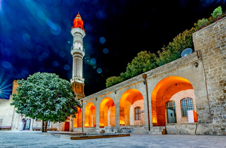 Night view Sehidiye Mosque and Madrassa though arch,a popular landmark in Mardin,Turkey.のeditorial素材