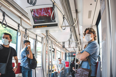 Unidentified Turkish people wear mask while transporting at tramway train in Istanbul,Turkey :16...