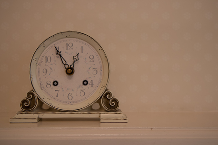 Old beige clockの写真素材