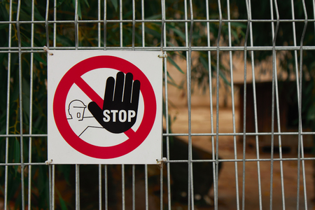 Sign STOP on the fence.の写真素材