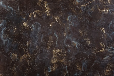 Black texture acrylic painted waves texture background. Pattern can used for wallpaper or skin wall tile luxurious.の写真素材