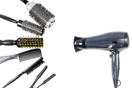 Tools hairdresser's top view on white isolateの写真素材