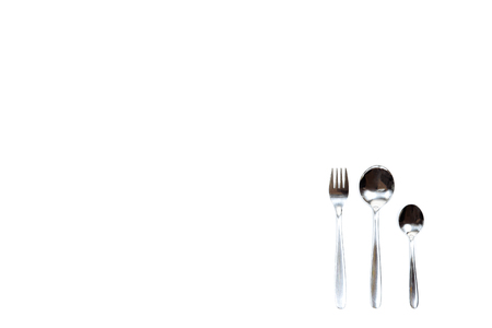 Cutlery on a white isolate the top view.の写真素材