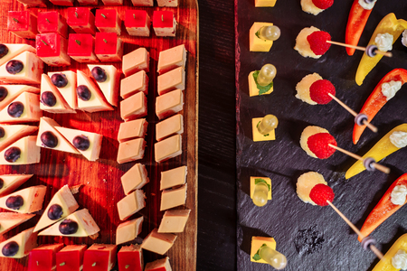 Delicious decorated candy bar, sweets on a buffet table at a luxury event or celebration. Catering food.の写真素材