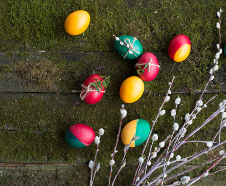 decorated Easter eggs on wooden background