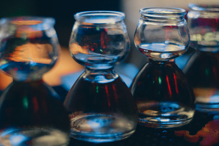 Alcohol drink shots, four glassesの写真素材