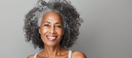 Portrait of a beautiful african american businesswoman with gray hairの素材