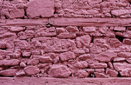 Pink stone wall with woodの写真素材
