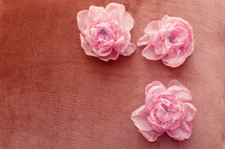 artificial flowers pink handmade velor tissue backgroundの写真素材