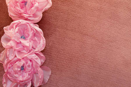 artificial flowers pink handmade velor tissue backgroundの写真素材