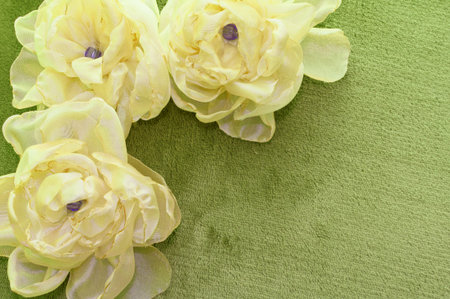 artificial flowers yellow  handmade velor tissue backgroundの写真素材