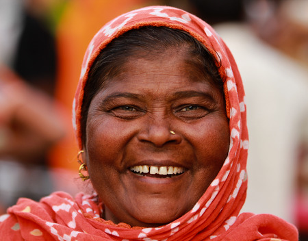 JAIPUR, INDIA Ð MARCH 4: An unidentified woman outside the City Palace on March 4, 2012 ahead of the annual Holi Festival in Jaipur, Rajasthan, Northern India. The City Palace includes the Chandra Mahal and Mubarak Mahal palaces.のeditorial素材