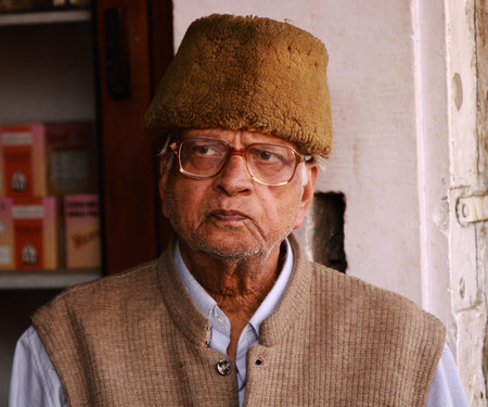 JAIPUR, INDIA Ð MARCH 4: An unidentified man outside the City Palace on March 4, 2012 ahead of the annual Holi Festival in Jaipur, Rajasthan, Northern India. The City Palace includes the Chandra Mahal and Mubarak Mahal palaces.のeditorial素材