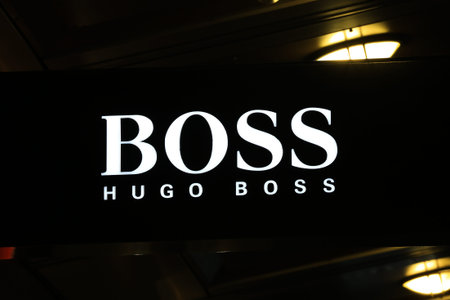 SYDNEY, AUSTRALIA â SEPTEMBER 13, 2014: Hugo Boss illuminated sign at night in Sydneyâs CBD shopping district, an area synonymous with luxury shopping brands.のeditorial素材