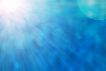 Blue Color with light rays and blurred backgroundの写真素材