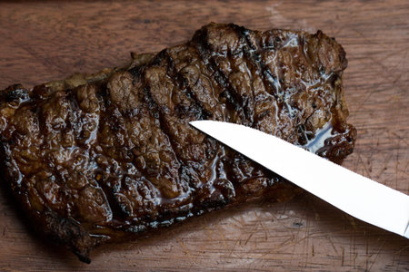Char-Grilled Steak served on Wooden Board