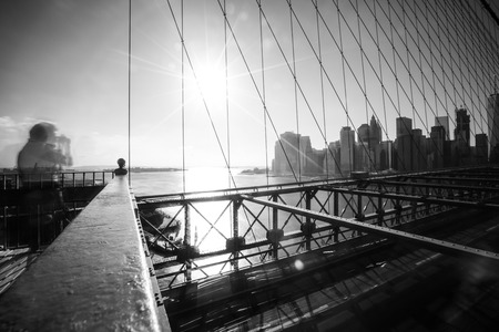 Skyline of downtown New York, Brooklyn Bridge and Manhattan in the afternoon sun light , New York City, USAの写真素材