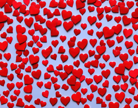 Seamless pattern of red hearts on a blue background. Vector illustration.の写真素材