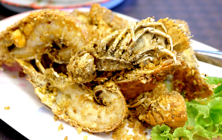 Freshly caught lobsters made on the grill with delicious butter garlic sauce.の写真素材
