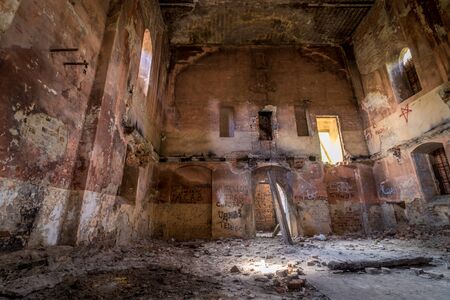 Abandoned church standing in the middle of the forest, completely empty