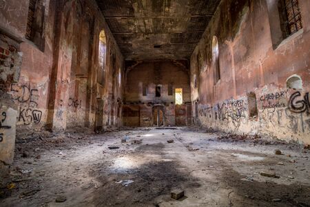 Abandoned church standing in the middle of the forest, completely emptyの写真素材