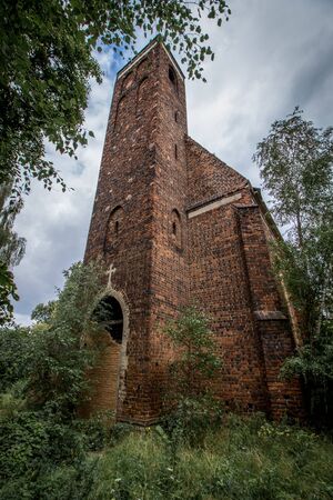 Abandoned church standing in the middle of the forest, completely emptyの写真素材