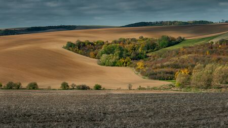 Beautiful harsh landscape of plowed Moravian fields in the autumn seasonの写真素材