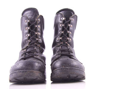 worn black amry boot isolated on whiteの写真素材